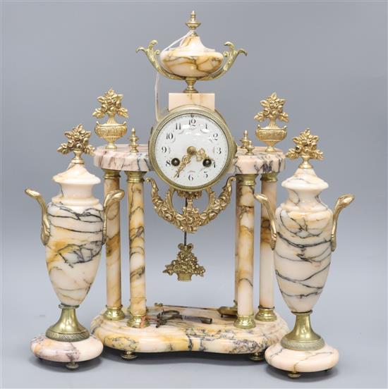 A pink marble French pillar clock garniture H.45cm